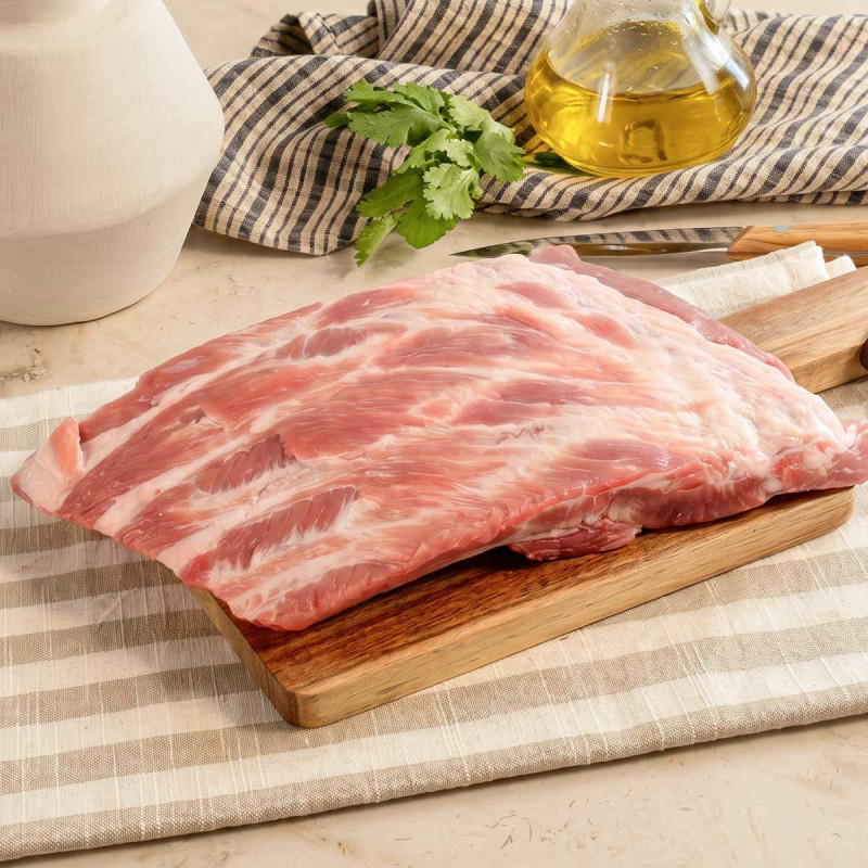 Costilla de cerdo Duroc, al corte que desees. Pesa 210 gr por tira
