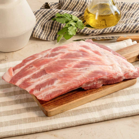 Costilla de cerdo Duroc, al corte que desees. Pesa 210 gr por tira